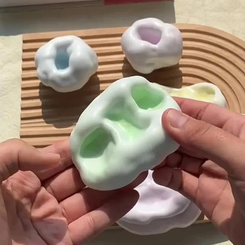 Shapeable Vacuum Squishes Sand Ball.
